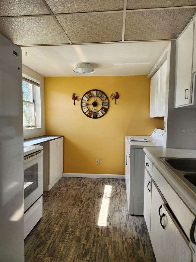Cozy kitchen with full size washer and dryer | Image 2
