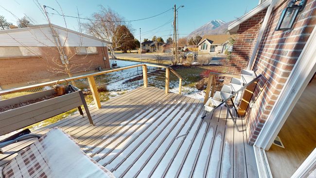 Wooden deck with a mountain view | Image 12