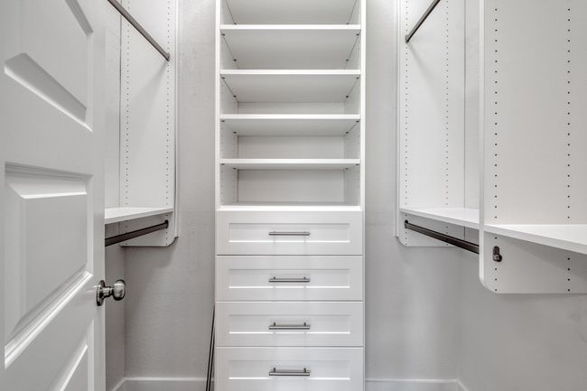 View of walk in closet | Image 21