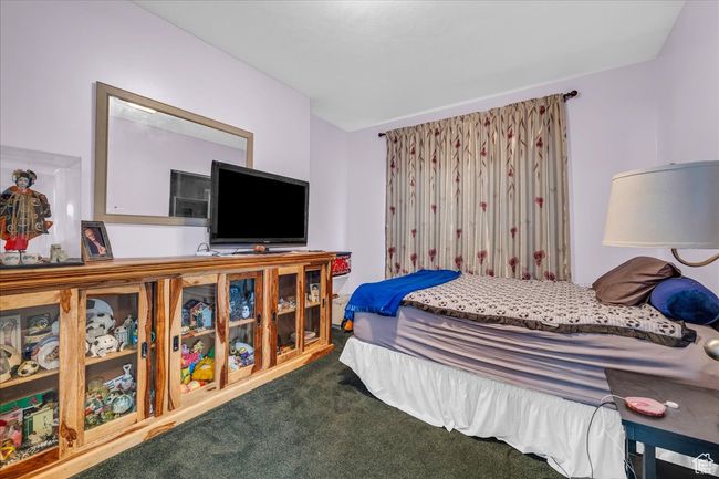Bedroom featuring carpet flooring | Image 25