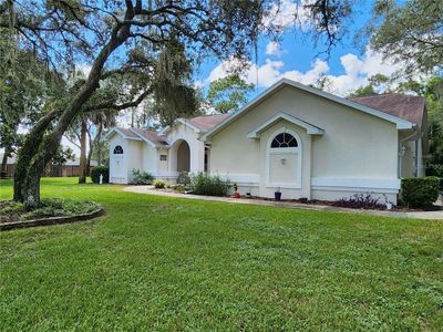 10464 Woodland Waters Boulevard, House other with 4 bedrooms, 2 bathrooms and null parking in Weeki Wachee FL | Image 2