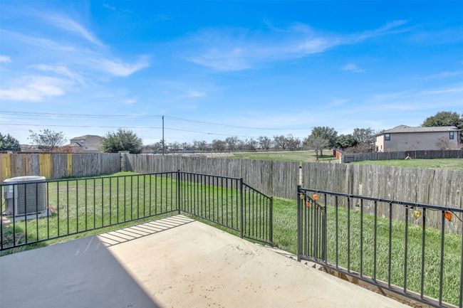 View of patio / terrace featuring central air condition unit and a fenced backyard | Image 33