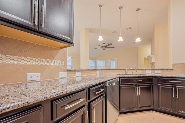 4914 Woodbury Mill Dr, House other with 4 bedrooms, 2 bathrooms and 2 parking in Spring TX | Image 7