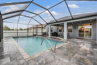 Huge covered lanai & pool area | Image 2