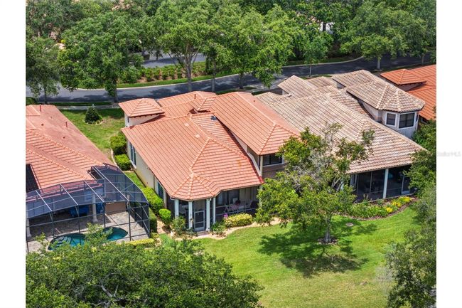 Check out the upstairs covered patio. | Image 28