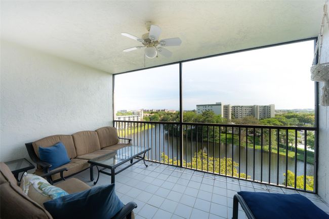 Screened in balcony overlooking the lake | Image 7