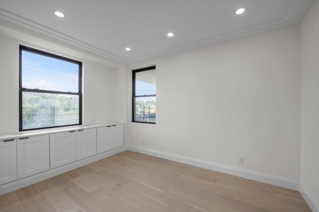 Unfurnished room featuring light wood finished floors and recessed lighting | Image 11