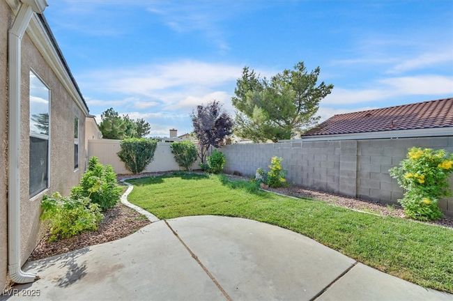 Fenced backyard featuring a patio area | Image 23