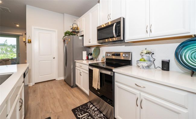 26082 Woven Wicker Bnd, Townhouse with 3 bedrooms, 3 bathrooms and null parking in LUTZ FL | Image 11
