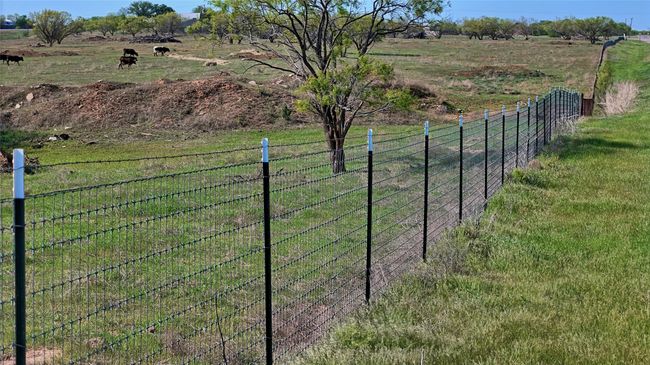View of yard with fence and a rural view | Image 33