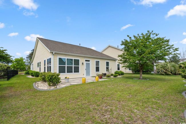 Back of property featuring a patio, fence, and a yard | Image 30