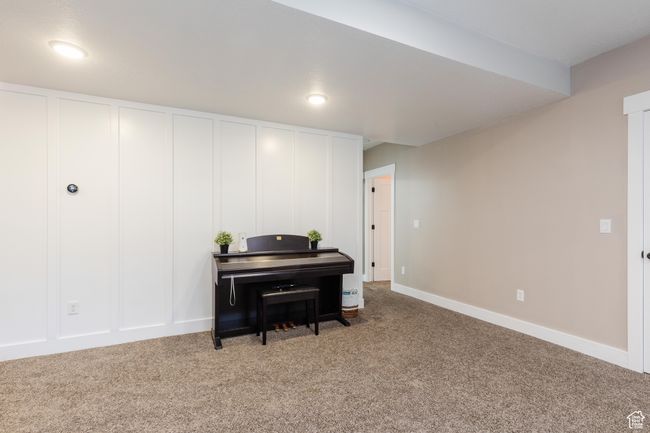 Sitting room with carpet and baseboards | Image 30