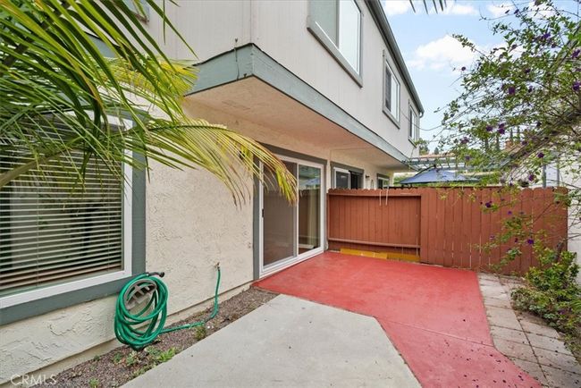 Private spacious back patio from slider to garage | Image 16