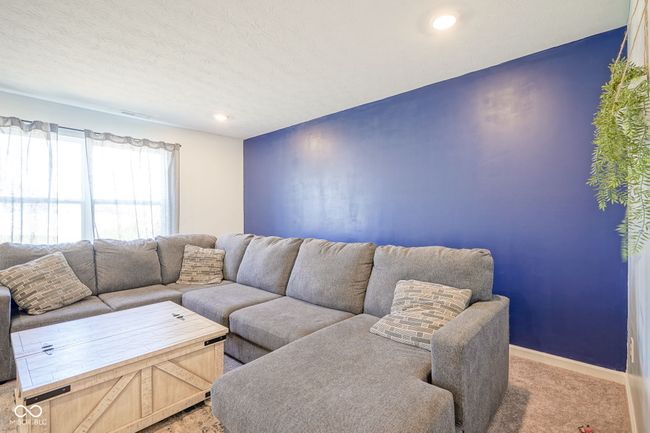 living area with carpet floors and recessed lighting | Image 9