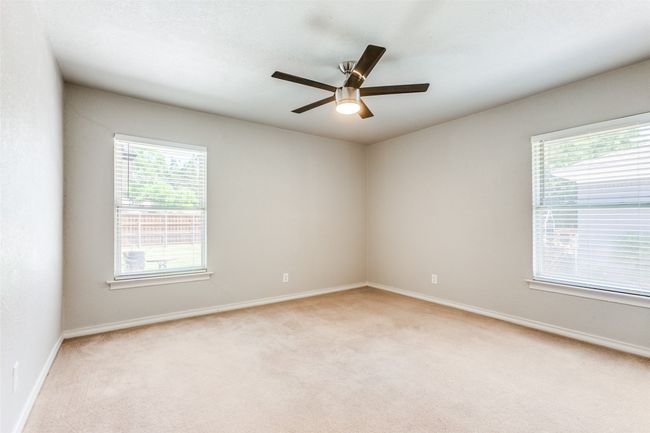 Secondary Bedroom is next to Large Full Bath in Hallway. | Image 11