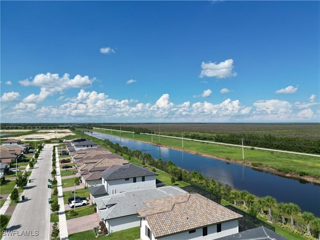 Bird's eye view with a water view and a rural view | Image 6