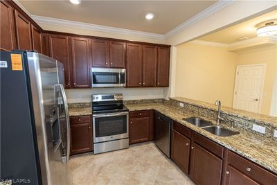 8875 Via Isola Court, Townhouse with 3 bedrooms, 2 bathrooms and null parking in Fort Myers FL | Image 2