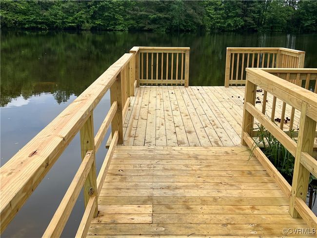 Deck featuring a water view | Image 44