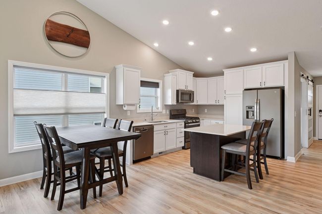The kitchen is complete with a stainless steel appliance package! | Image 10