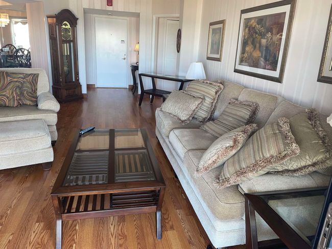 Interior space with wood finished floors and access to exterior | Image 6