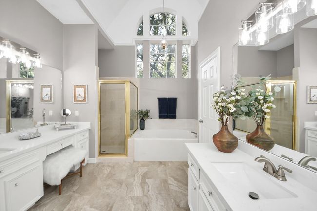 Primary Bath with his & hers vanities. | Image 20