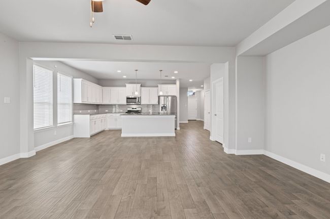 Living Room Looking Towards Dining, Kitchen & Front Door | Image 10