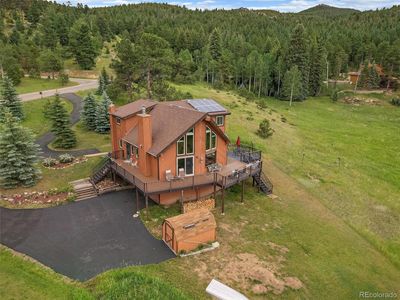 8091 Grizzly Way, House other with 3 bedrooms, 1 bathrooms and 6 parking in Evergreen CO | Image 1