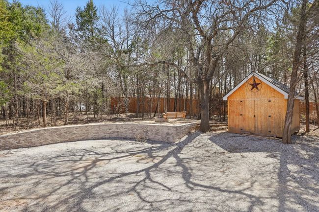 View of yard with an outbuilding and a shed | Image 31