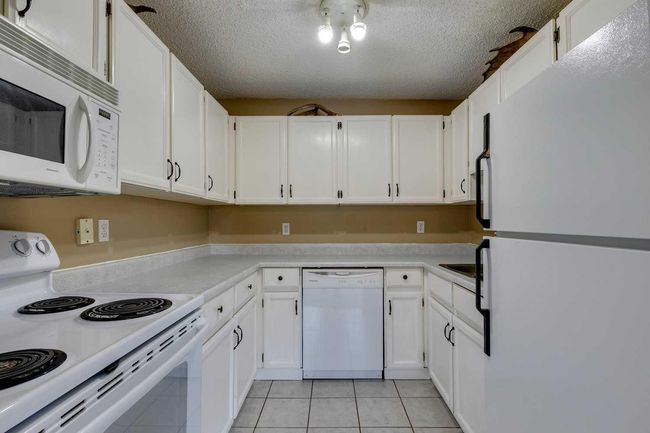 84 - 200 Shawnessy Dr Sw, Townhouse with 2 bedrooms, 2 bathrooms and 1 parking in Calgary AB | Image 16
