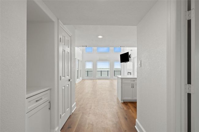 Looking from Laundry room to living. | Image 17