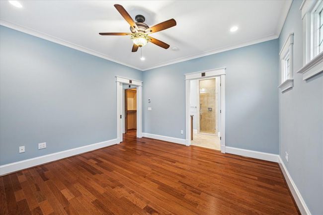PRIMARY SUITE VIEW TOWARDS THE EXTRA ROOM AND BATHROOM | Image 26