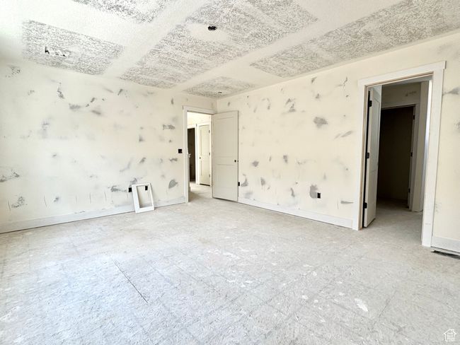 Empty room featuring baseboards | Image 14