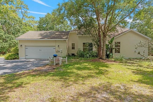 11933 Pasco Trails Blvd, House other with 4 bedrooms, 3 bathrooms and null parking in SPRING HILL FL | Image 31
