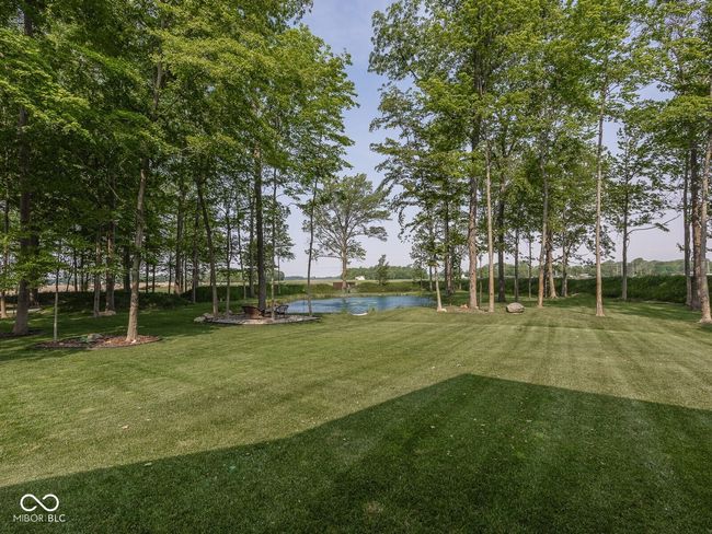 view of grassy yard featuring a water view | Image 51