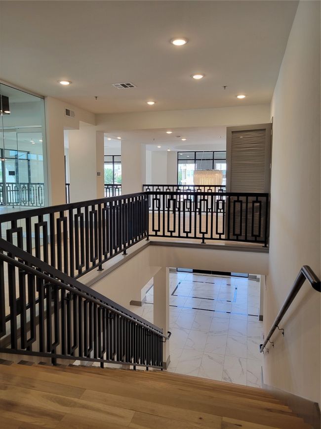 Stairs featuring recessed lighting, visible vents, and marble finish floor | Image 23