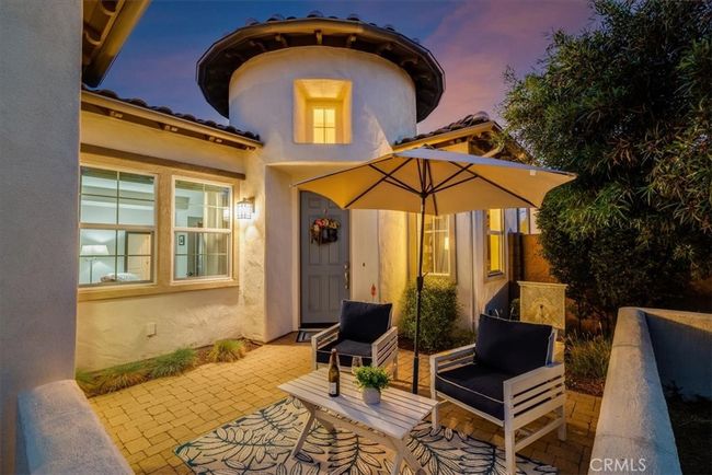 Front entry gated courtyard with fountain. | Image 6