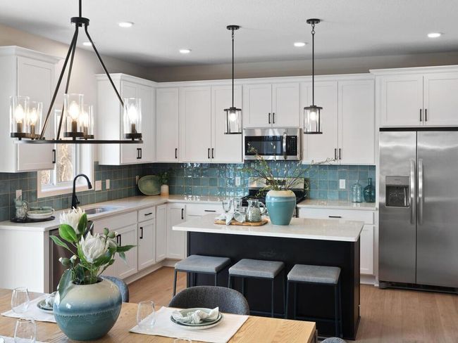 Step into this spacious kitchen, where style meets functionality. With ample counter space, modern appliances, and a convenient walk-in pantry, it’s the perfect space for both everyday cooking and hosting special gatherings. | Image 14