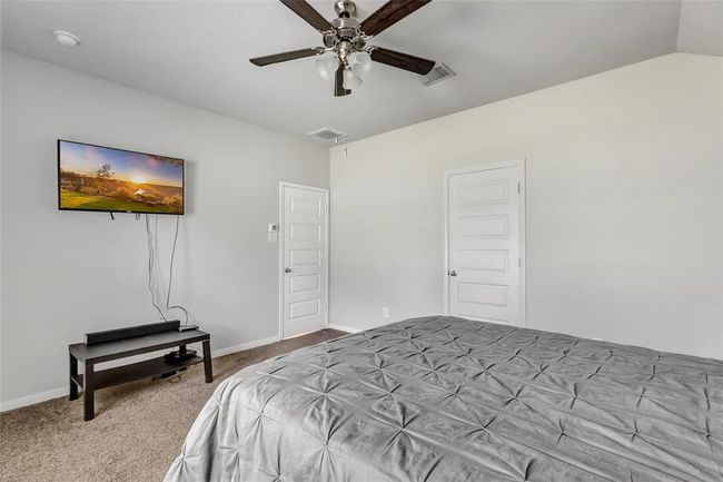 Another view of primary bedroom. | Image 29