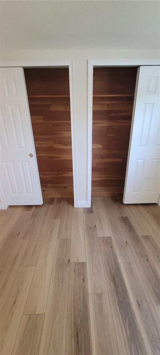 Front bedroom-Cedar paneled inside closets | Image 15
