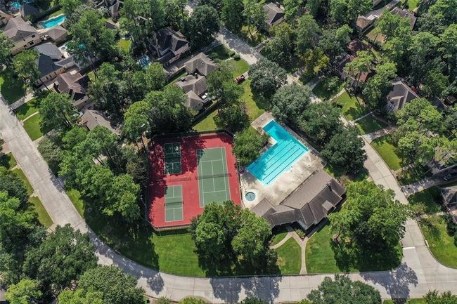 While the neighborhood feels peaceful and tucked away, you’re never far from everyday conveniences. Top-rated schools, shopping, and dining options are just minutes away — making it easy to enjoy both relaxation and accessibility. | Image 49