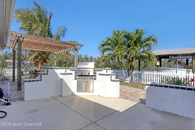 1061 Bali Rd, House other with 4 bedrooms, 2 bathrooms and null parking in Cocoa Beach FL | Image 46