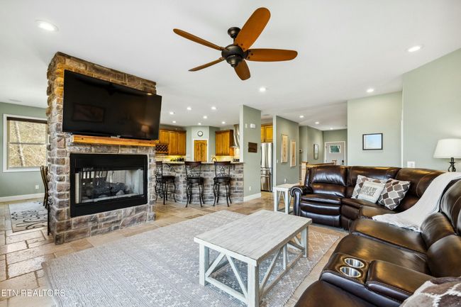 Open concept into the kitchen and dining room. | Image 12