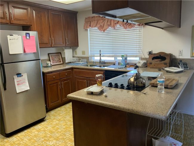 Upgraded cabinets, granite countertops | Image 4