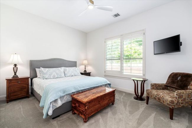 Carpeted bedroom featuring baseboards and a ceiling fan | Image 27