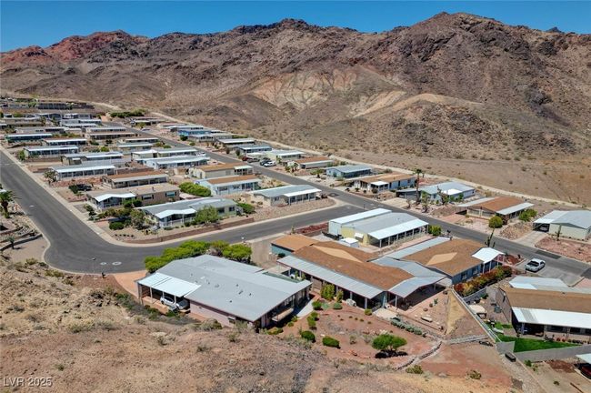 Aerial perspective of suburban area with a mountainous background | Image 74