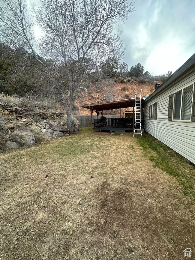 View of yard featuring fence | Image 18