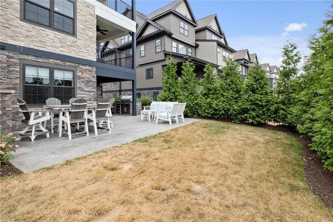 Fenced rear and side yard. Could easily add additional side fence to completely enclose rear and side yard for unit. | Image 45