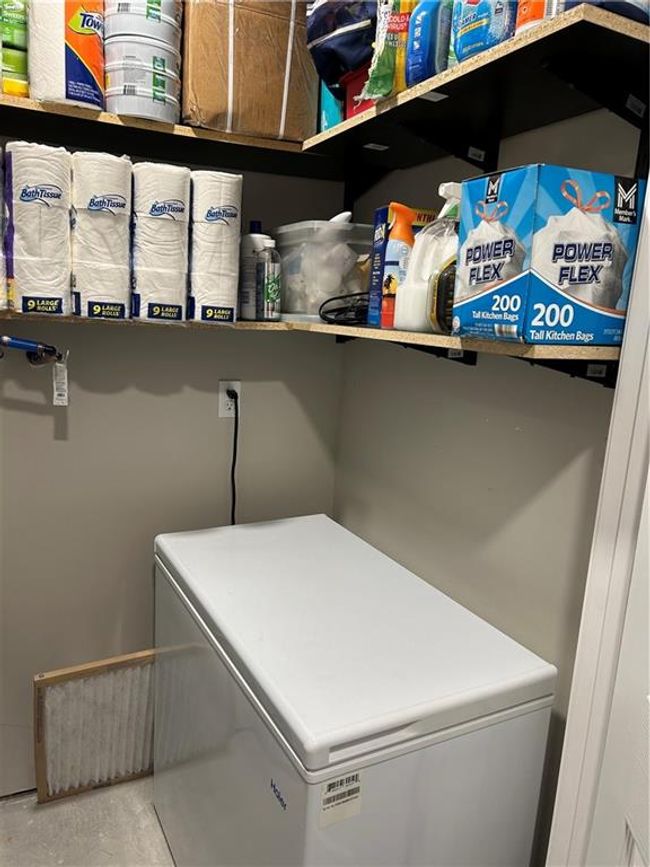 Extra shelving & room for a small deep freezer in the utility room | Image 26