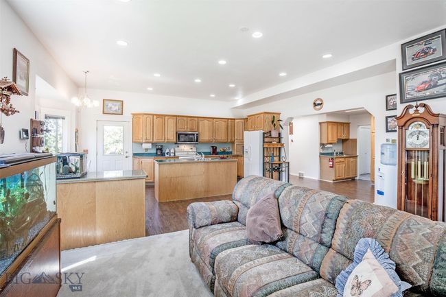 large open living area with lots of natural light | Image 11