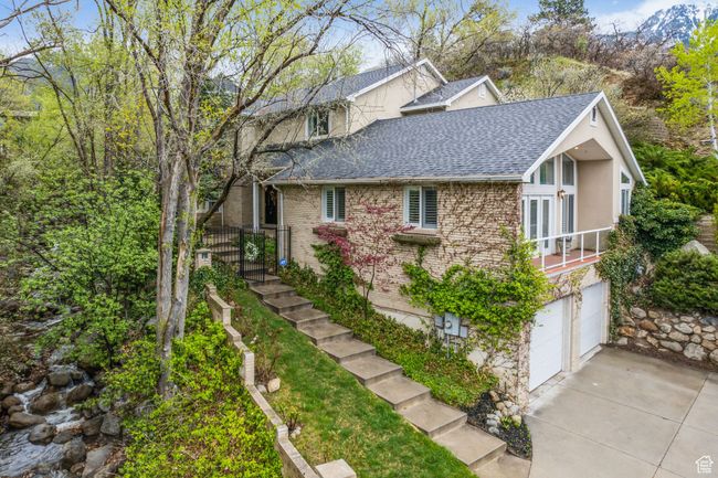 View of home's exterior featuring creek | Image 29